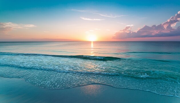 soft pink sun rises over the calm turquoise waters of a florida beach at dawn