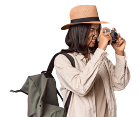 Traveling Filipino young woman with vintage camera