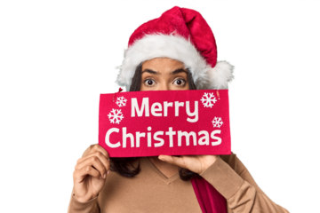 Young Filipino with "Merry Christmas" sign