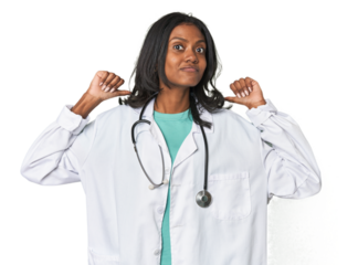 Young Indian doctor with stethoscope feels proud and self confident, example to follow.