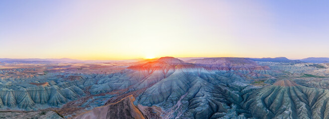 Sunrise illuminating the vibrant geological formations and deep valleys of Nallıhan, Turkey....