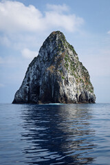 The picturesque Monument Rock (Wotanimanu), located off Mataso Island, Vanuatu, is a unique rock...