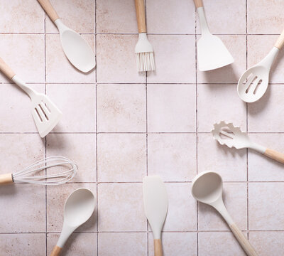 range of kitchen silicone spatulas ready for sale. Pattern made from cooking utensil set. - Powered by Adobe