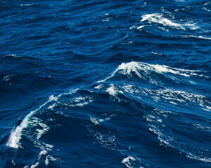 Deep Blue Ocean Waves with Whitecaps at Sea