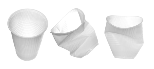 Empty new wrinkled white disposable plastic cup flying, clipping path
