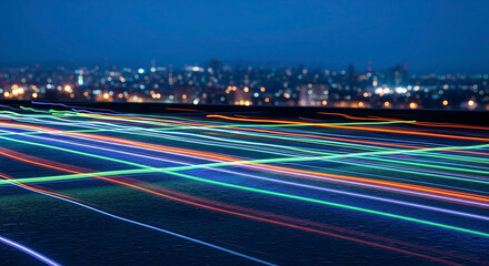 Dynamic Light Streaks on a Surface with a Blurry Cityscape in the Background
