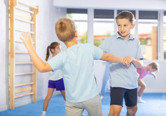 Children are focusing on their hand grip techniques to develop better control and power