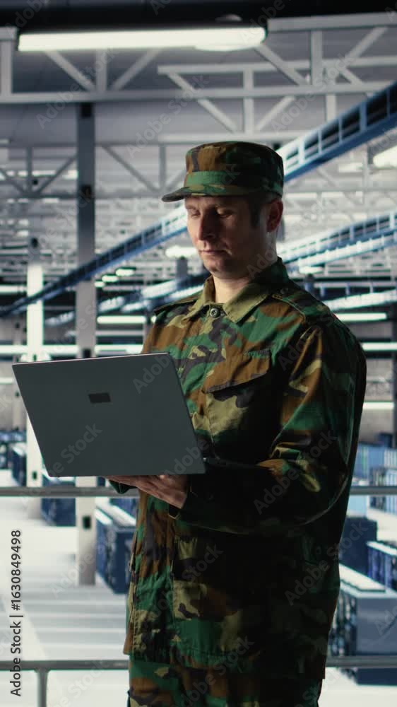 Poster vertical video military soldier and engineer in server room use ai tools to manage computer systems.