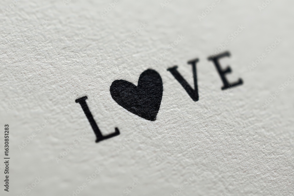 Poster captivating monochrome depiction of love illustrated through bold typography emphasizing heart symbo