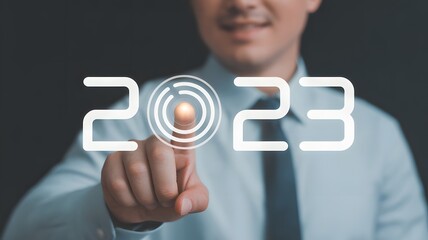 Businessman Touching Number Two In 2023 On Virtual Screen Representing New Year Start Innovation Future Technology And Digital Progress

