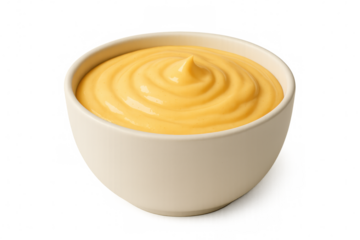 Creamy cheese sauce spiraling within white ceramic bowl, transparent backdrop highlighting culinary texture and richness