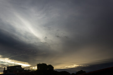 Cloudscape, Colored Clouds at Sunset near the city 