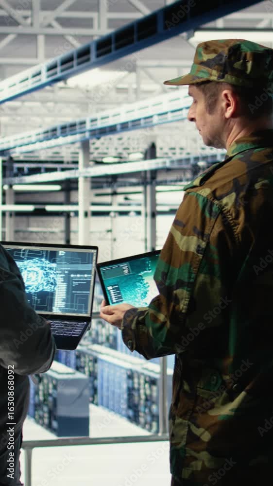 Poster vertical video army commander and software developer in data center integrating ai into radar system