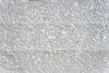 Close-Up of Clear Plastic Bubble Wrap Texture with Bright Natural Lighting