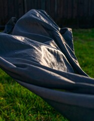 Dark fabric billowing in the breeze