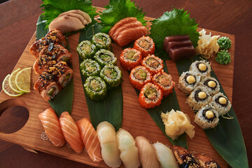 A Vibrant Sushi Platter Featuring an Assortment of Fresh Selections Including Rolls, Sashimi, and...