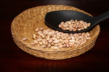 Brazilian beans on the wicker basket.