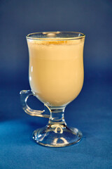 A Close-Up View of a Creamy Beverage in a Clear Glass, Perfectly Capturing the Smooth Texture and Delicious Creaminess Ready to Be Enjoyed