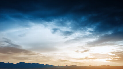 Fototapeta premium Dramatic sunrise and sunset sky with vibrant clouds, showcasing warm and cool color contrasts in a panoramic view.