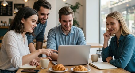 Fototapeta premium Collaborative Workspace Team Meeting with Laptop and Refreshments