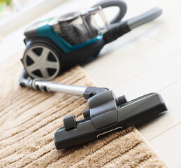 One vacuum cleaner on floor indoors, closeup