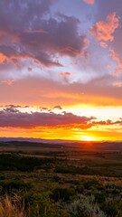Obraz premium Dramatic sunset over a valley