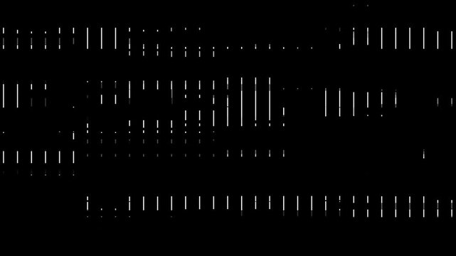A close-up shot of a pattern of white lines in a dark room. The lines are evenly spaced and parallel to each other