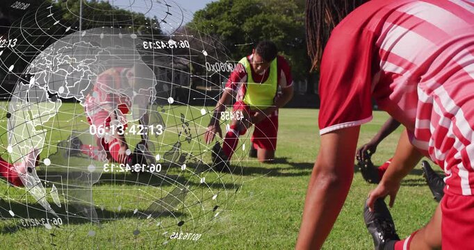 Soccer team warming up via hamstring stretch after hologram activation, syncing under data globe