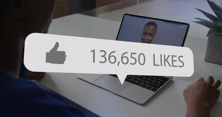 Female colleague joining work call and watching like count updating on laptop tracking engagement