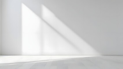 Obraz premium Light and Shadow Play: A minimalist scene of architectural elegance, where the interplay of sunlight and shadow creates a stark, yet beautiful, contrast on a smooth, expansive surface.