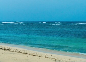 A captivating snapshot of Pandawa Beach, Bali, with its exotic white sand and stunning turquoise ocean