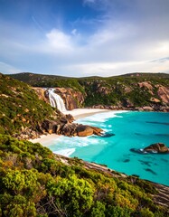 Obraz premium Coastal waterfall and beach scenery