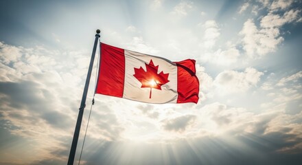 Canadian Flag Flying in Bright Sunlight with Cloudy Sky