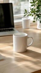 Obraz premium White Coffee Mug on Wooden Desk with Laptop and Green Plant