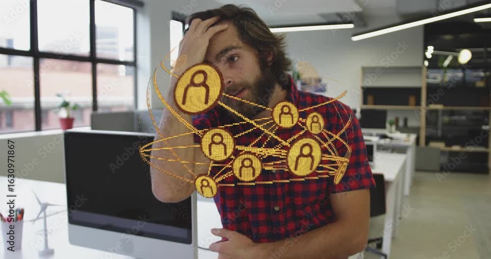 Poster bearded worker leaning against desk initiating spinning tech network linking data around torso