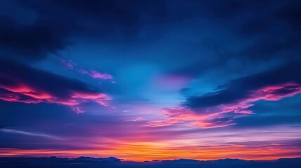 Fototapeta premium Vibrant sunset painting the sky with hues of purple and pink