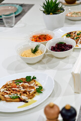 A Deliciously Plated Assortment of Colorful Culinary Delights Featuring Fresh Ingredients on a Modern Dining Table