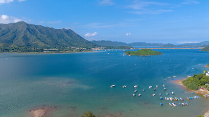 Scenic Coastal Landscape with Mountains and Clear Blue Waters