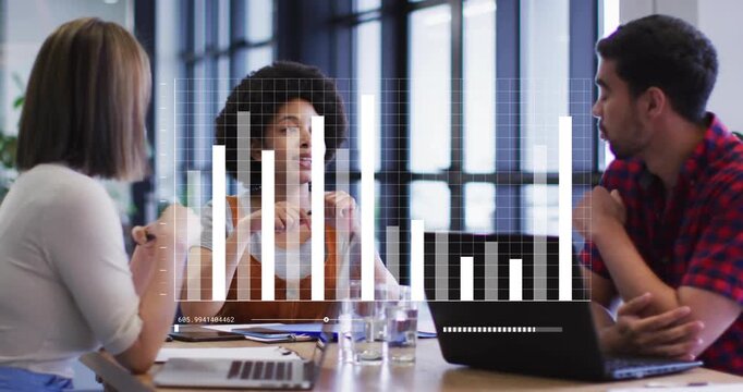 On overlaid bar chart appearing in business meeting, presenter lifting pen and comparing data bars