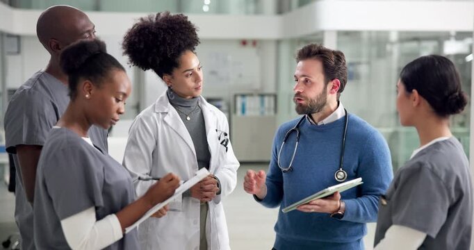 Doctor, hospital manager with tablet and nurses in meeting together for feedback, healthcare or report. Administration, internet and talking with medical people in clinic for discussion or planning