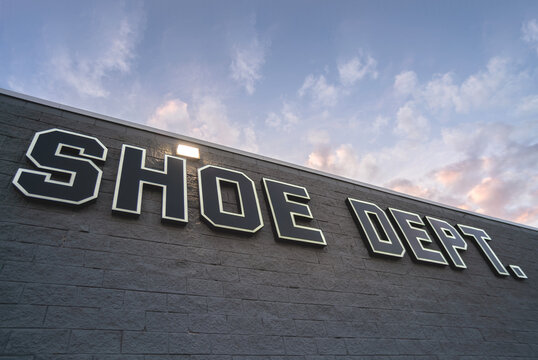 New Hartford, NY - Jul 25, 2025: Close-up view Shoe Dept. Signage on high wall, is an American footwear retailer based in Concord, NC and has 63 years of experience owned by Shoe Show, Inc.