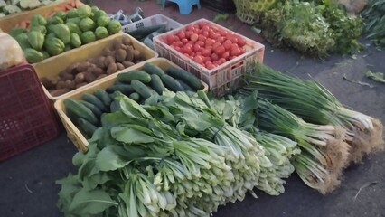A Close-Up View of Fresh Vegetables Neatly Arranged at a Traditional Morning Market Stall