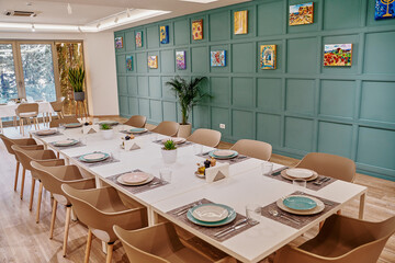 Stylish Dining Space with Elegant Table Setting and Artistic Decor for Memorable Gatherings and...