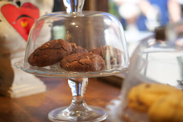 Freshly baked cookies displayed in a cafe setting