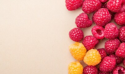 Fresh raspberries on light background
