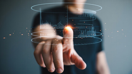 Person interacting with a digital financial data visualization interface image photo