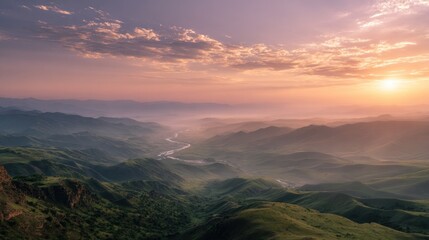 Obraz premium Sunrise over Misty Mountain Ranges: A Breathtaking Panorama