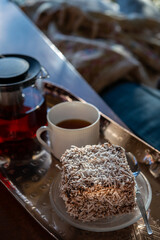 Lamington Cake with Tea on a Copper Tray