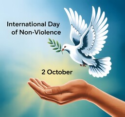 Dove of peace with olive branch landing on open hand for international day of non violence