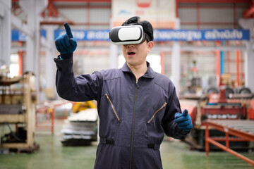 Engineer or technician wearing virtual reality glasses(VR) in the factory